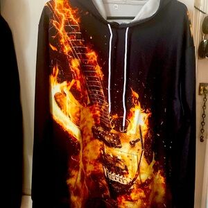 There are No tags … 2X size hoodie with front pocket n tie …guitar flamed front